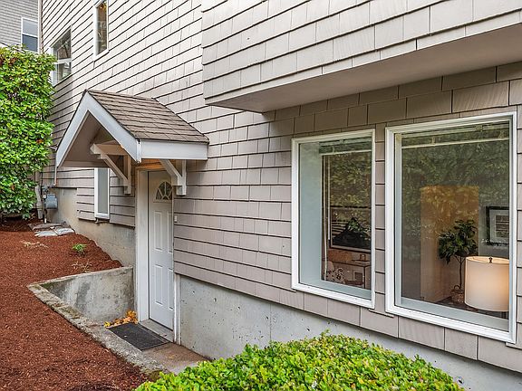 Big windows bring in natural light to living space.