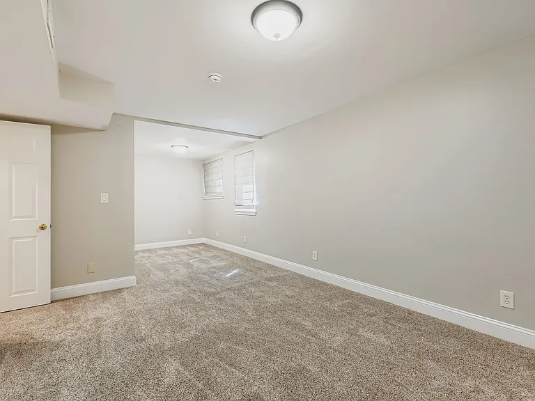 Large lower level private bedroom with en suite bathroom and large closet