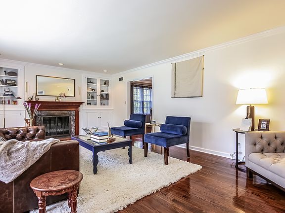 Large Living Room with Marble Wood Burning Fireplace