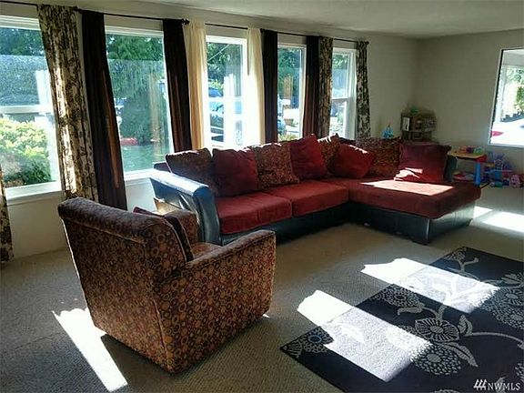 The living room from the other end...very large space, even room for the kids toys.