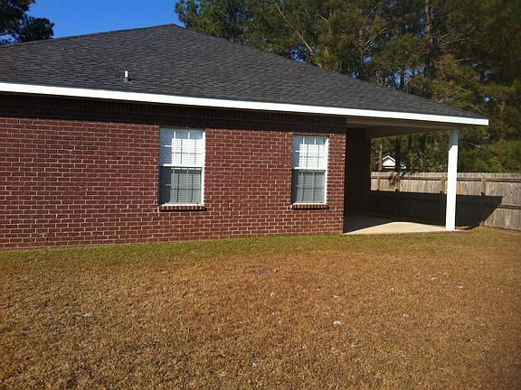 Rear. Spacious back yard. Sprinklers inground.