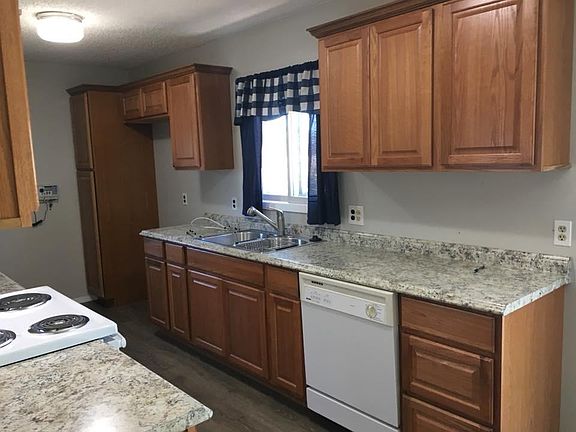 Brand new kitchen cabinets and counter-tops.