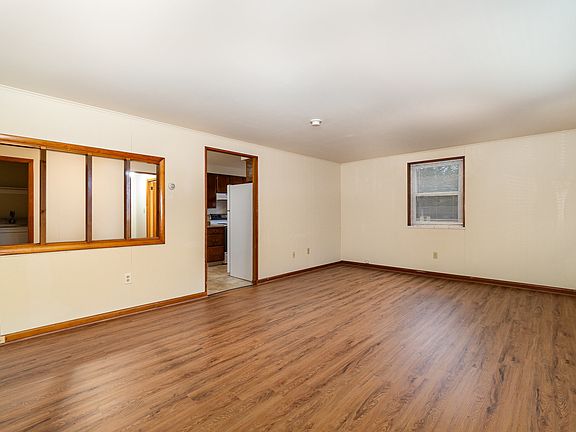 19 * 13 Spacious Living Area with New Flooring