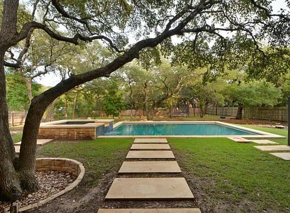 A private paradise awaits you in the backyard.