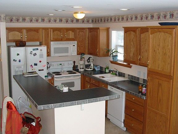 Exceptional kitchen, tile edged countertops.