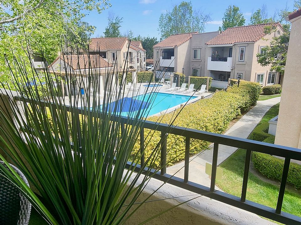 Extra large covered patio overlooks Pool/Spa. Patio furniture included.