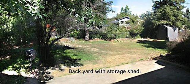 Backyard with storage shed.
