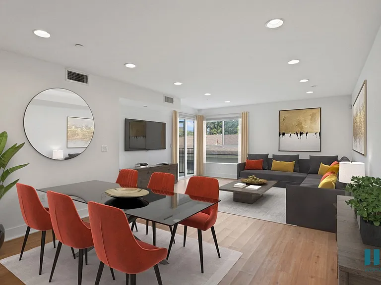 Open-Concept Dining and Living Room with Patio