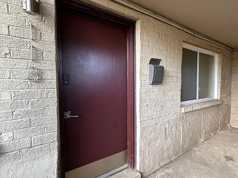 Apartment Entrance and front porch deck.