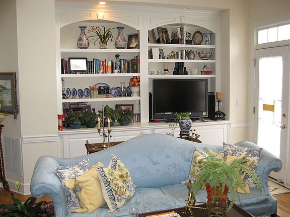 Living Room built-ins and access to the deck.