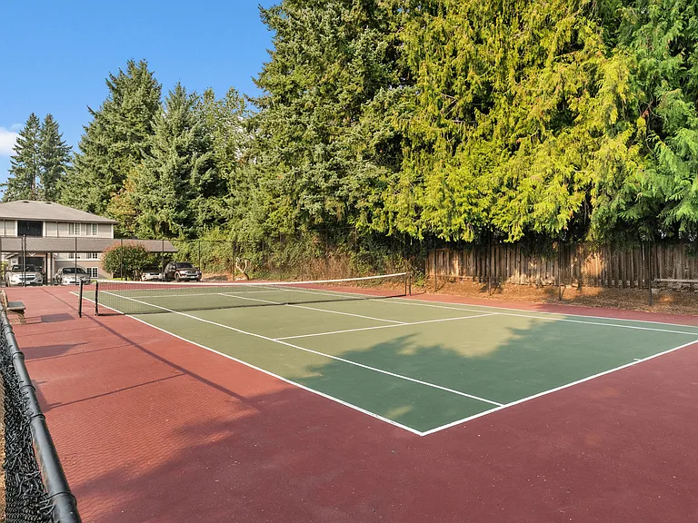 Community tennis court perfect for friendly matches and exercise.