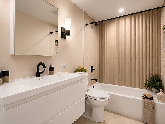 5th image of 423 95th St APT 2H