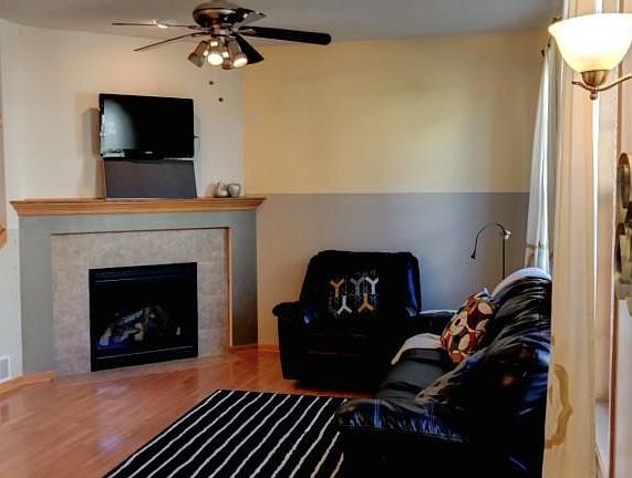 main level living area with gas fireplace.