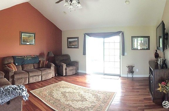 Living/Family
						:
						Leads out to back patio and back yard.