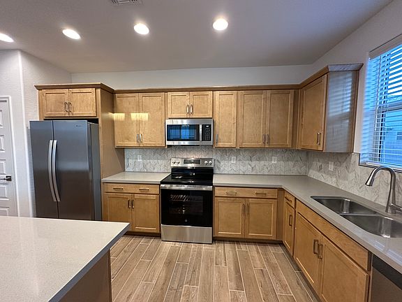 5th image of 10177 W Vale Dr