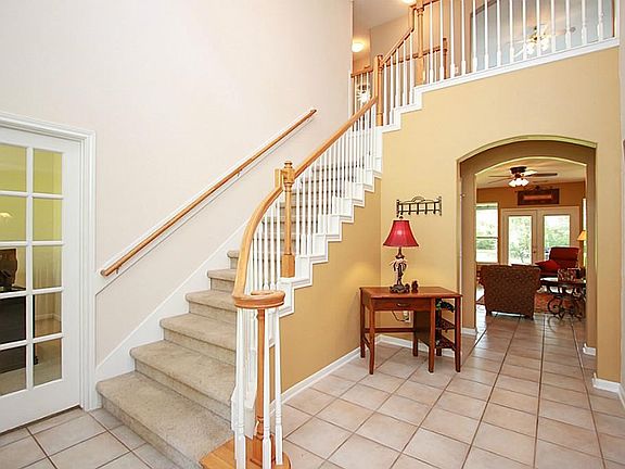Foyer area as you enter the home. Study to the left, living room in front and formal dining area to the right.