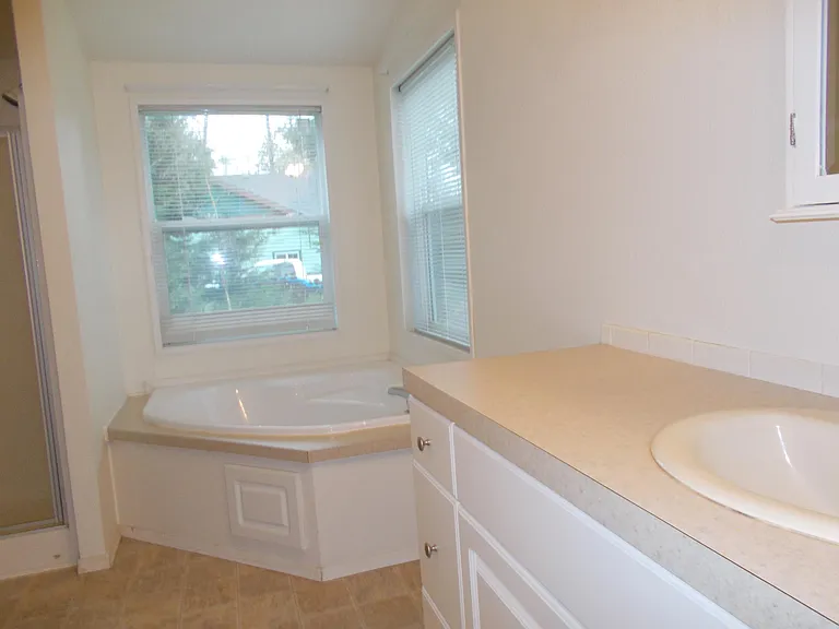 master bath with soaking tub