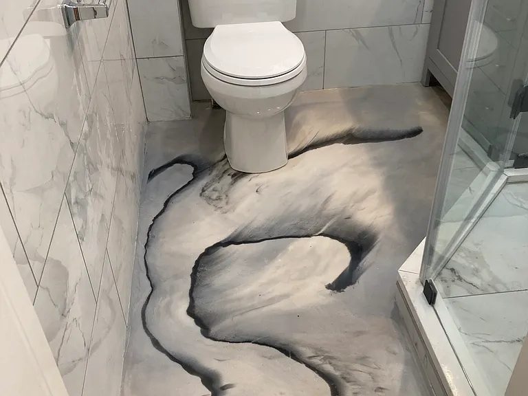 Epoxy concrete floor finish. Very easy to keep clean.