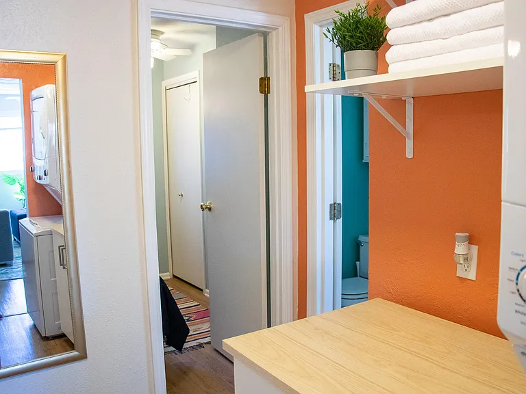 Hallway into 2nd bedroom and bathroom.