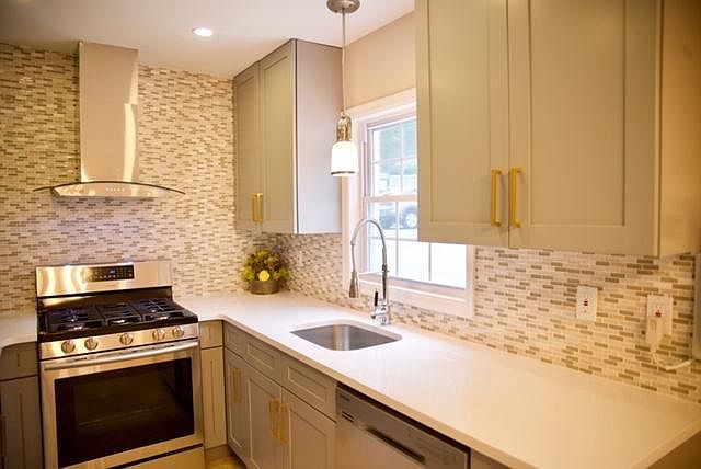 Sunny, designer planned kitchen, Quartz countertops, new cab