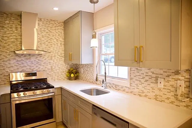 Sunny, designer planned kitchen, Quartz countertops, new cab