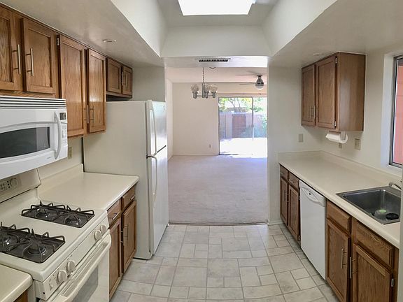 Kitchen has window, skylight and recessed lighting!