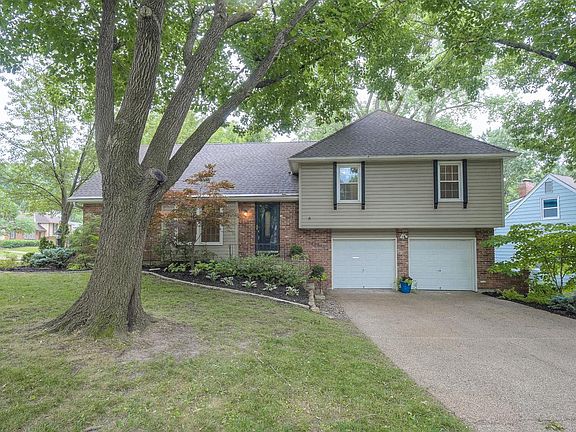 Two car garage and a wide drive for extra parking.