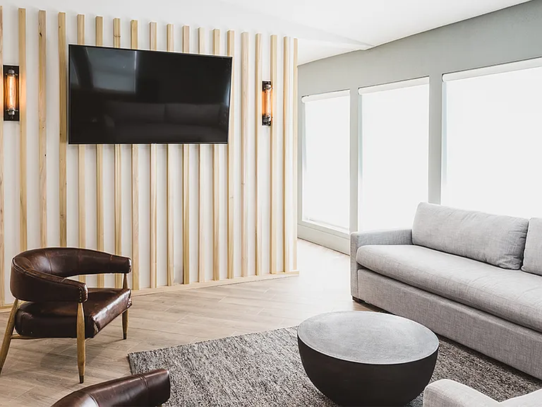 Reimagined clubroom with seating and TV