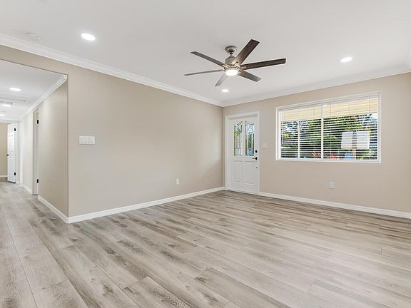 Open Living Room/Front Entrance to home