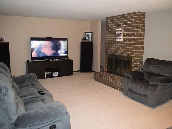 spacious living room with fireplace