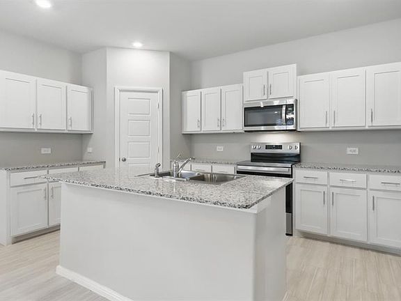 Kitchen - All Home and community information, including pricing, included features, terms, availability and amenities, are subject to change at any time without notice or obligation. All Drawings, pictures, photographs, video, square footages, floor plans, elevations, features, colors and sizes are approximate for illustration purposes only and will vary from the homes as built.