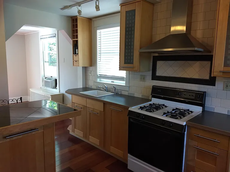 Arch on left leads to dining room.