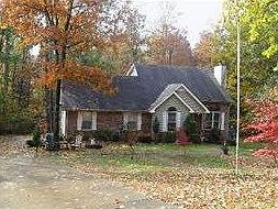 House built on hill and is 3 levels