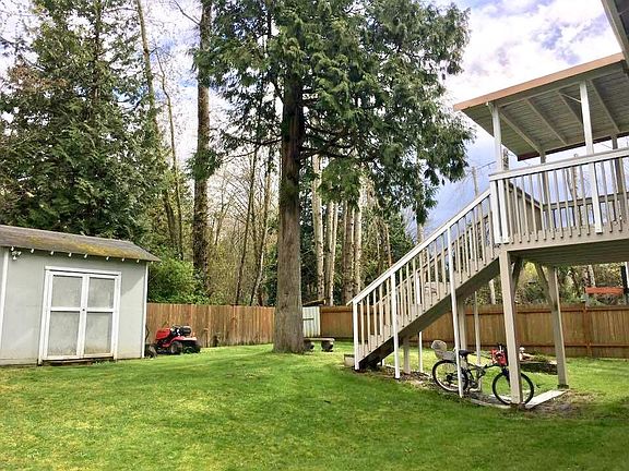 Spacious backyard with patio