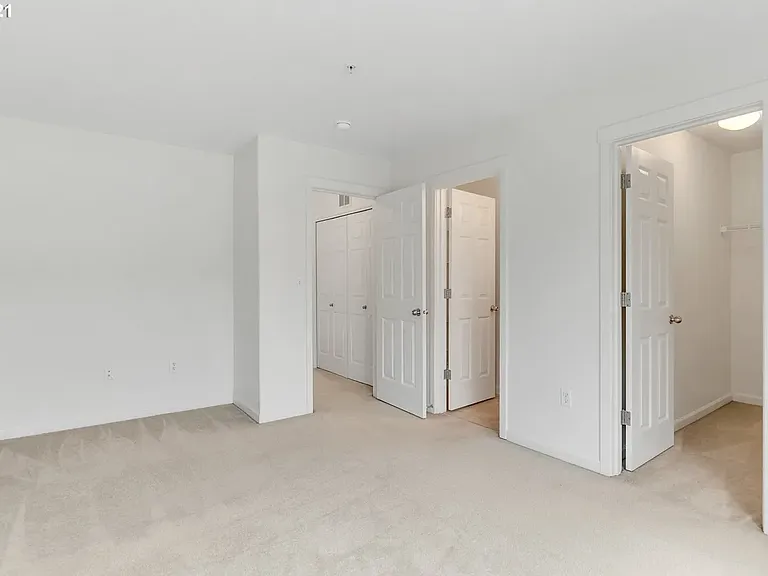 Master Bedroom with access to Walk-In Closet and Master Bathroom.