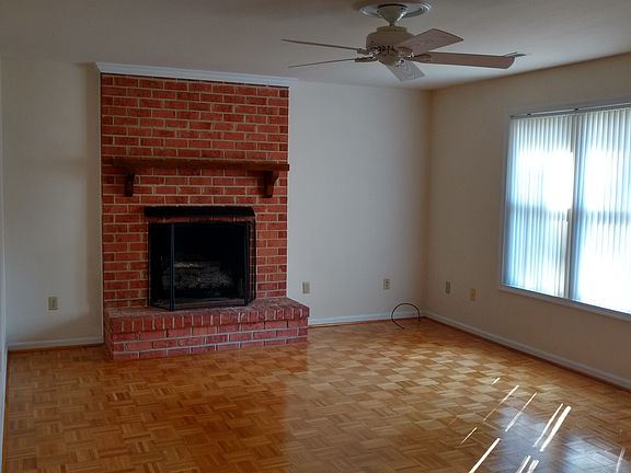 Living room, propane logs in fireplace