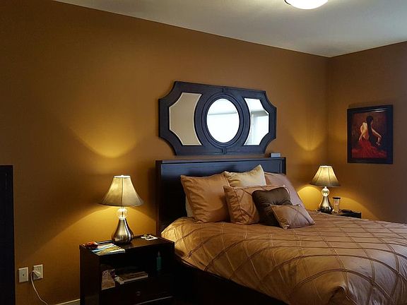 warm rich colors in master bedroom