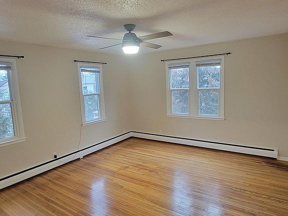 Lots of windows overlooking the back of the property toward Lake Minnetonka.