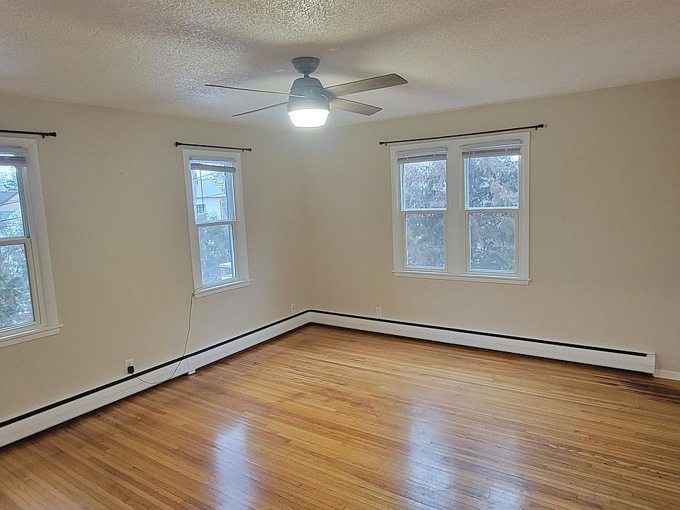 Lots of windows overlooking the back of the property toward Lake Minnetonka.