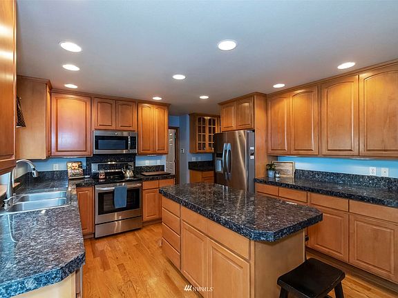 4th image of 9918 Orchard Ave SE