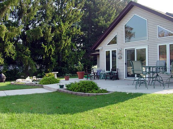 back patio and newly added sunroom