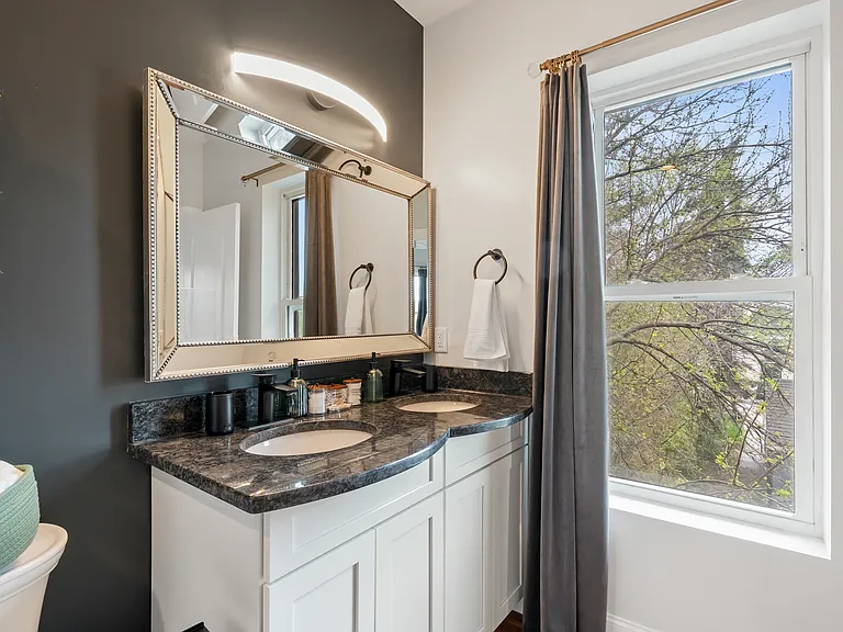 Ensuite bathroom to primary bedroom