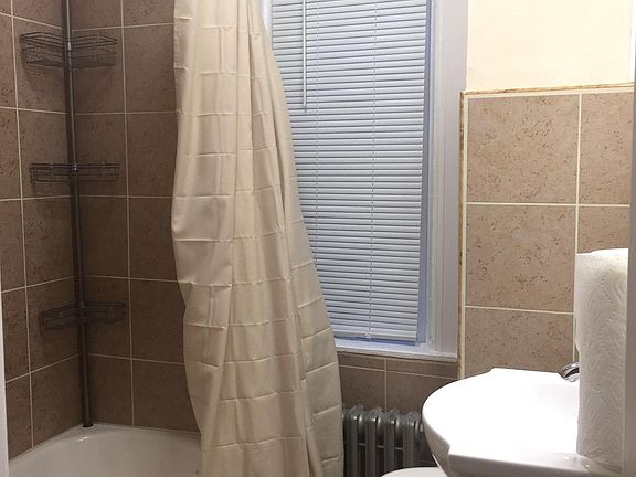 New tub, new tile floor, new tile surround........