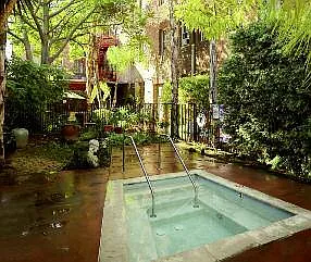 Jacuzzi located in our garden oasis.