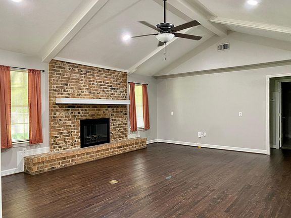 Vaulted Ceiling and Cozy Fireplace