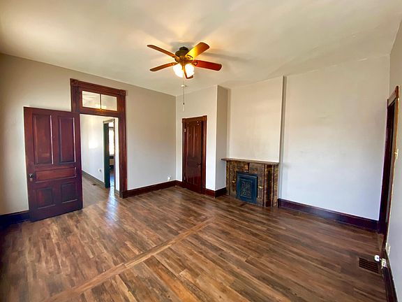 HUGE Master bedroom with beautiful original 1899 fireplace.