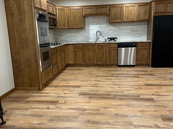 Kitchen with Double-oven, Cook-top, Microwave, Dishwasher, and Refrigerator/Freezer