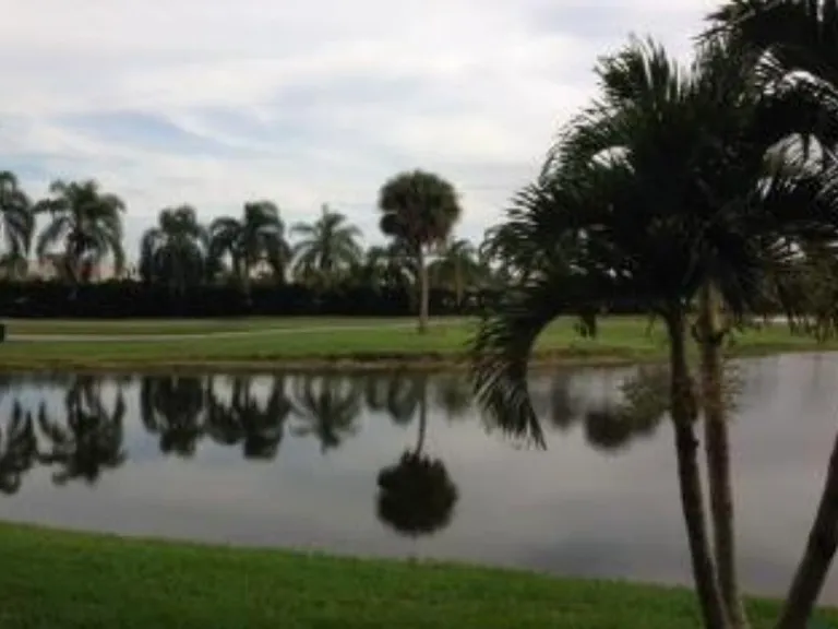 View looking left toward the par 3 6th hole and golf balls go away from our building so no broken windows!