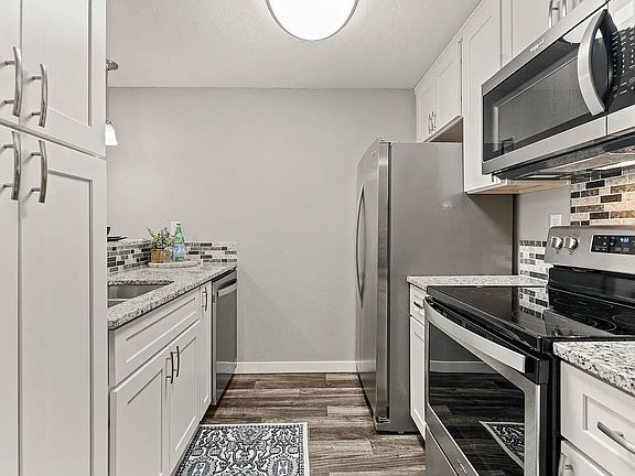 5th image of 6121 E 6th Ave #208