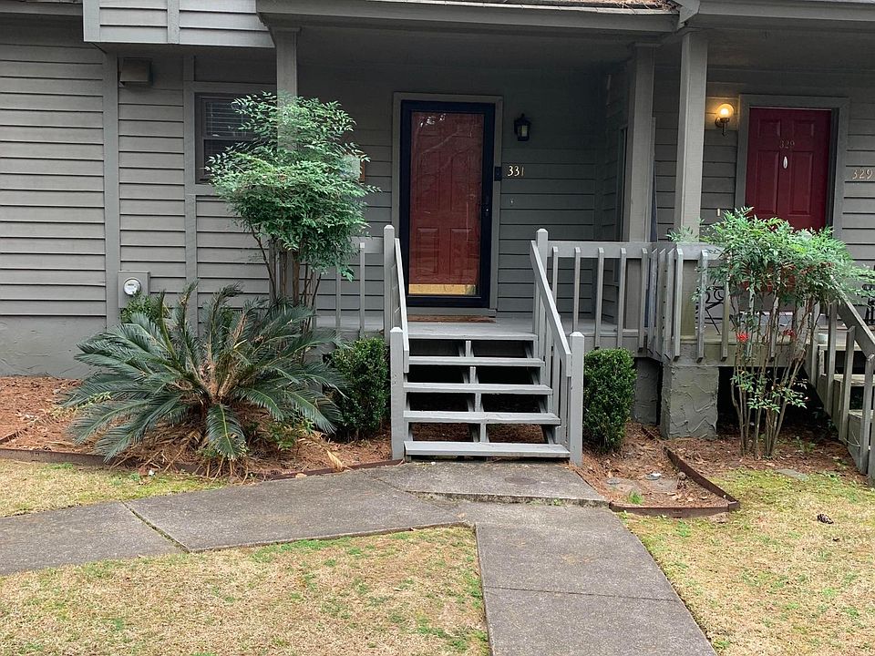 Front door with 2 designated parking spots